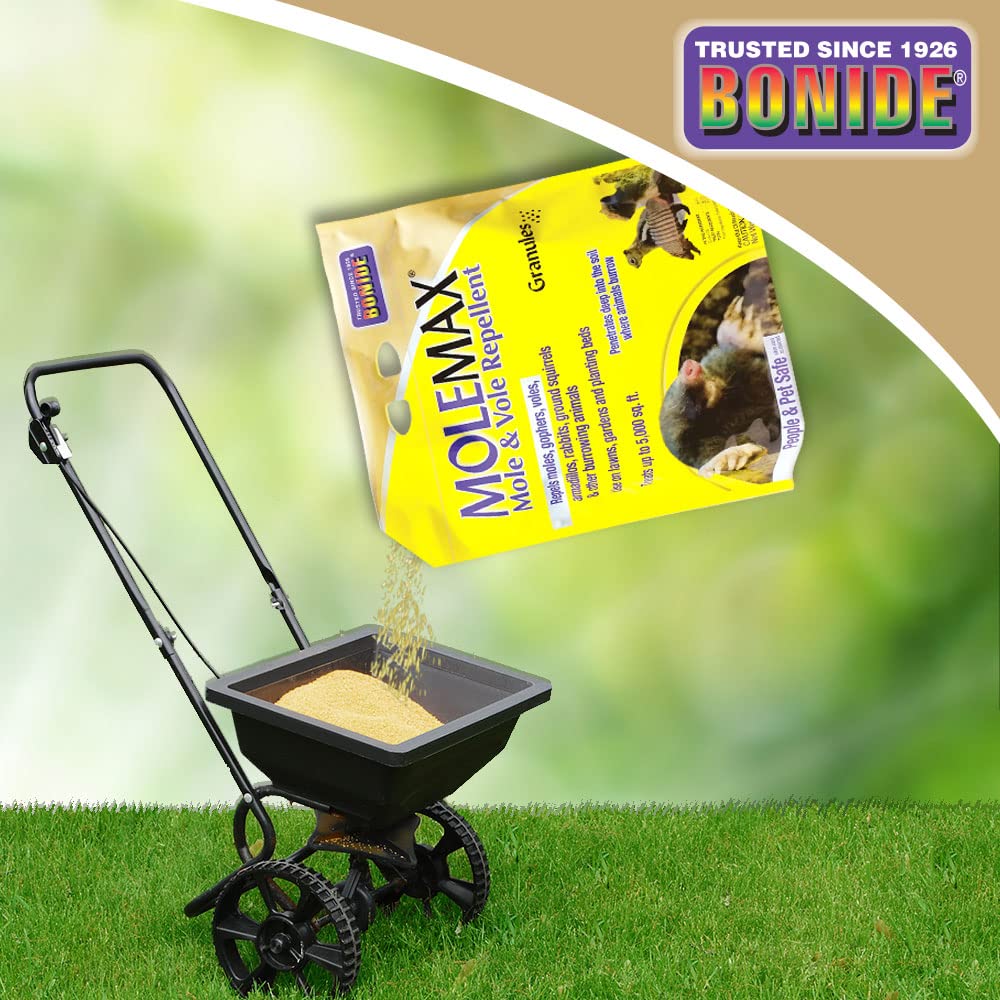 Applying Bonide MoleMax with a broadcast spreader